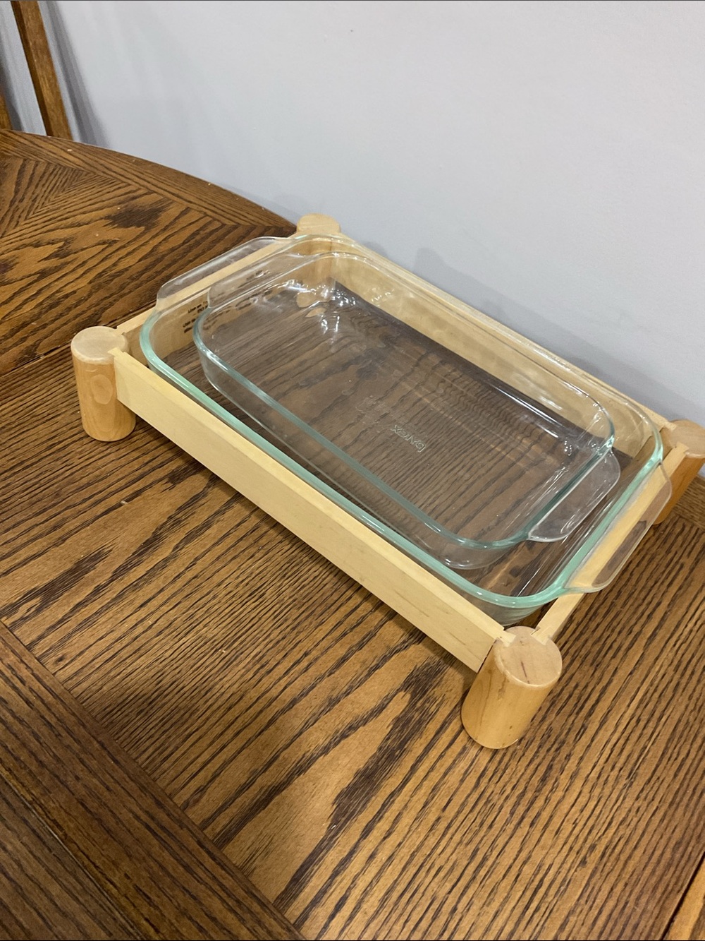 Pyrex 3 qt & 2 qt oblong baking dishes plus wooden holder and cutting board